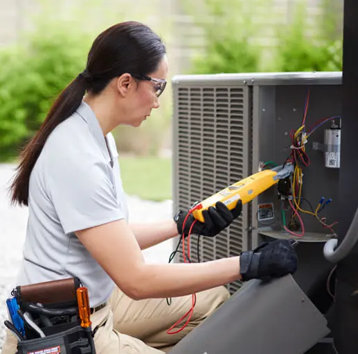A technician performs an emergency diagnostic on an air conditioning unit for The Chill Brothers.