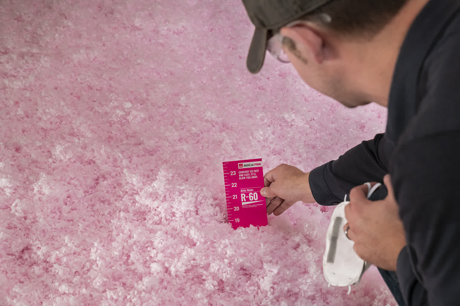 OC Atticat4551 091119 Man checking Insulation Provider in Houston, Dallas, Austin & North Carolina